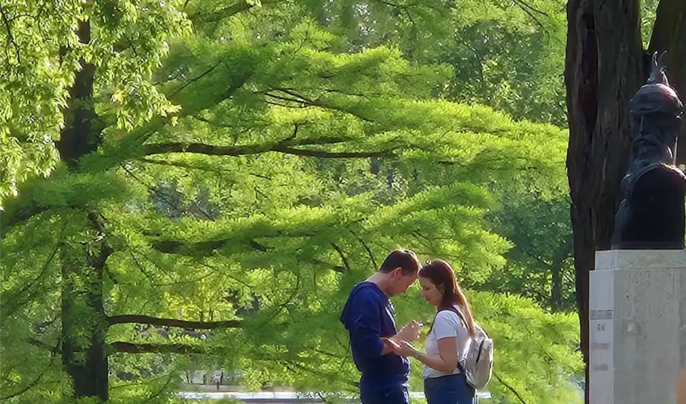 young couple playing a Landventure outdoor escape game in Budapest's City Park