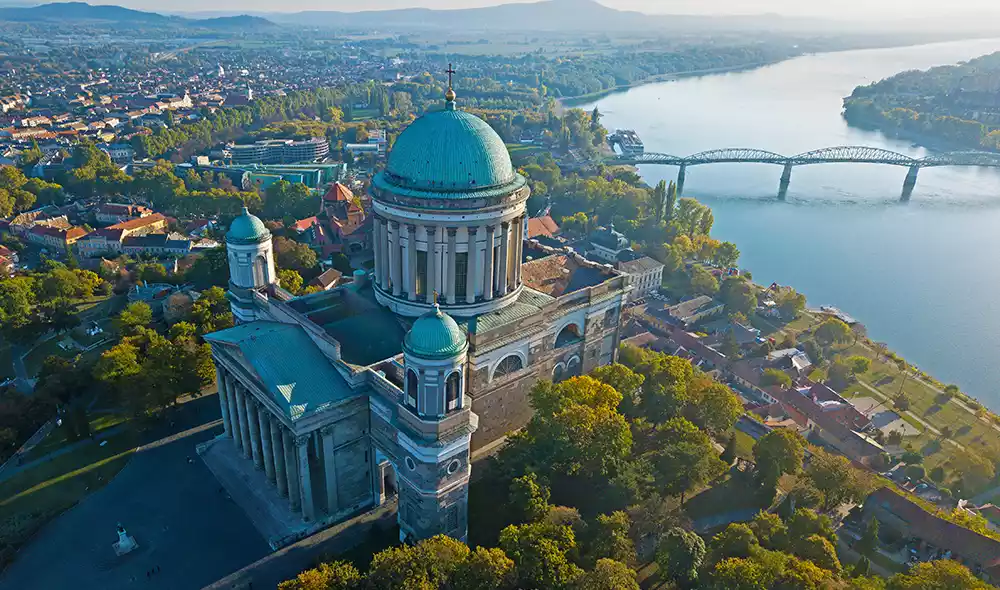 the view of the Esztergom Basilica in Esztergom, with the Danube River in the background