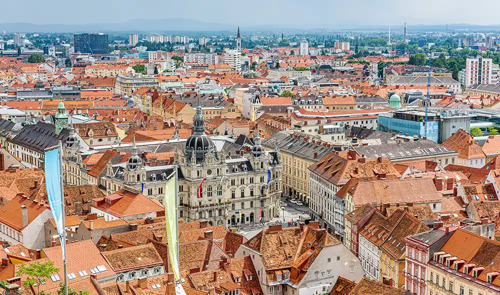 Panoramic view of Graz’s old town with the town hall and the red rooftops of the Styrian capital