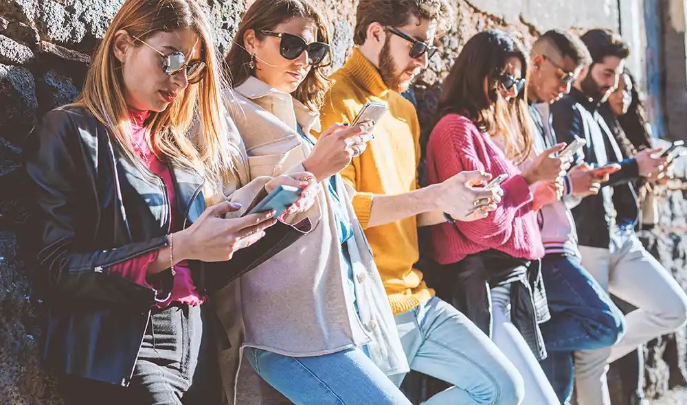 people are enjoying an exciting Landventure outdoor escape game in Salzburg and exploring the city center