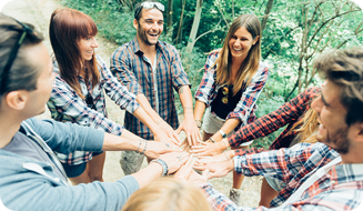 a group of coworkers taking part in a Landventure outdoor escape team building game
